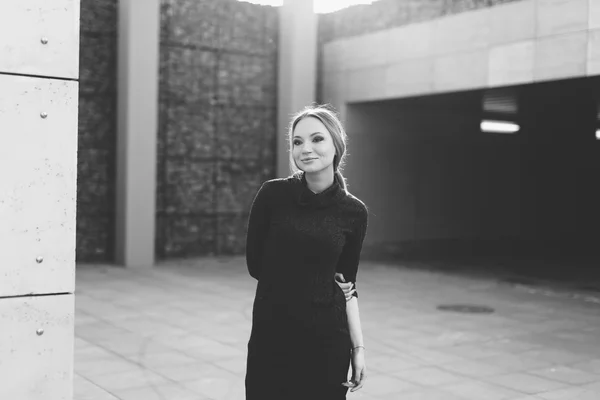 Young woman standing on the street