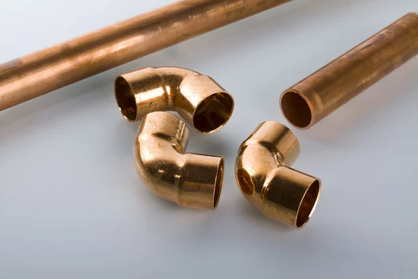 Copper fittings and tools.