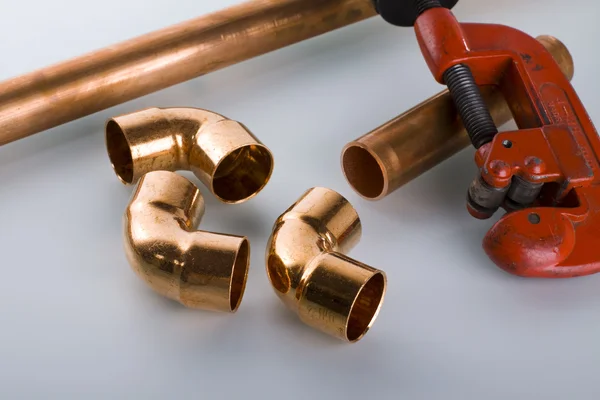 Copper fittings and tools.