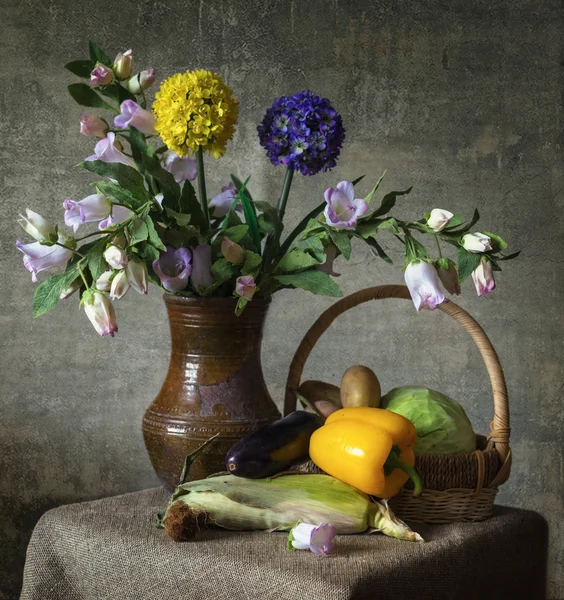 still life of flowers and vegetables