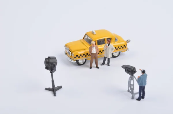 Movie making of small figure of  taxi