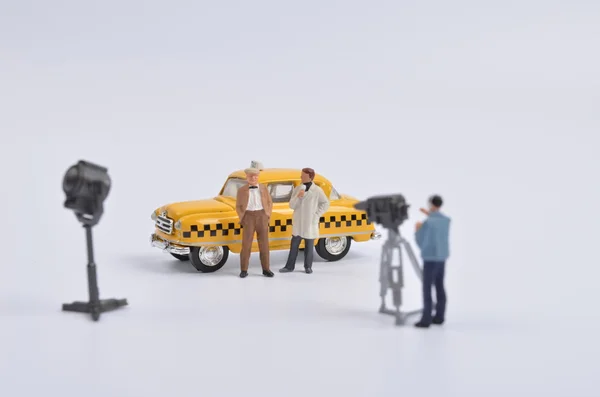Movie making of small figure of  taxi