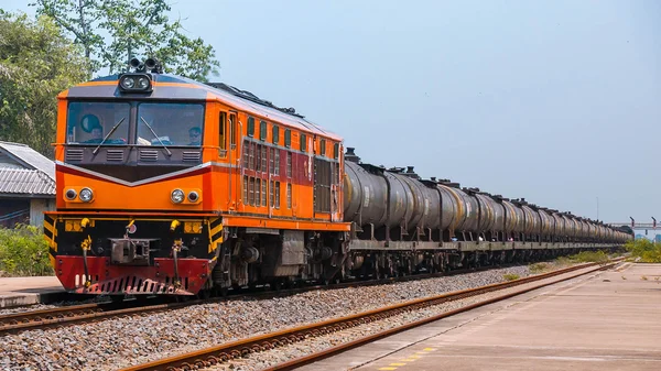 Crude-oil freight train was passing through rural station.