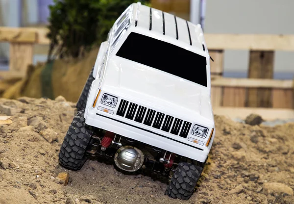 Car model shows off for demonstration runs on sand