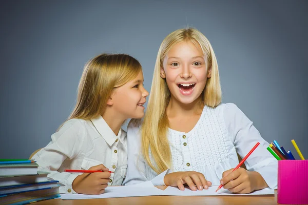 School concept. Closeup portrait successful happy girls drawing pencil