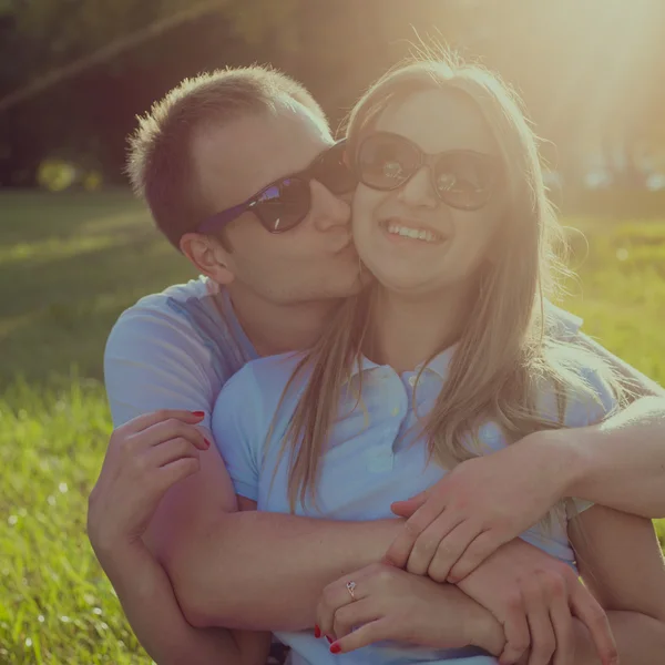 Funny couple in the sunglasses outdoor