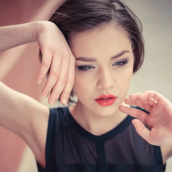 Vogue model in the black dress outdoor portrait