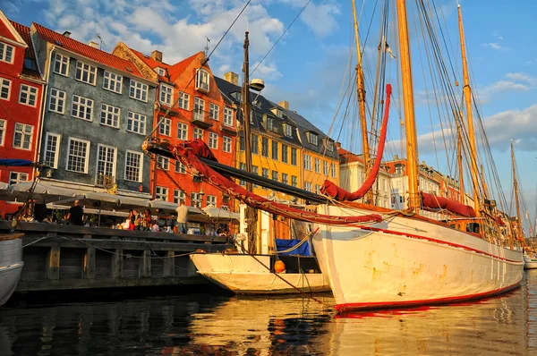 White yacht in Nyhavn - New Haven, Copenhagen, Denmark