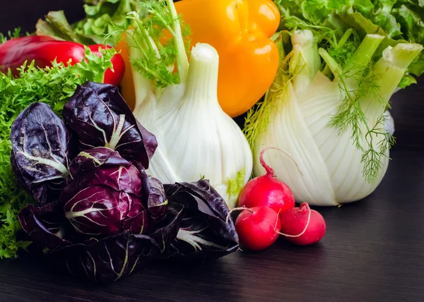 Different raw vegetables background