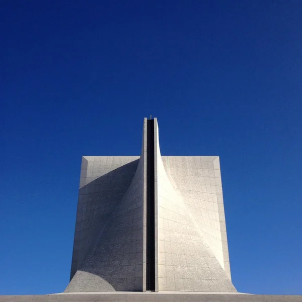 Modern church against blue sky