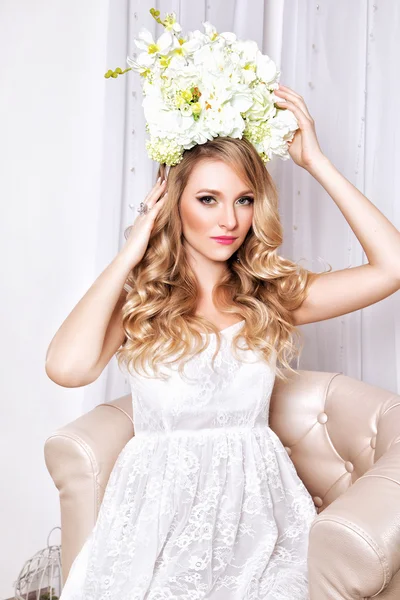 The portrait of a blond hair bride in white dress