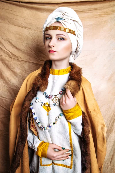 Portrait of slavic women from the past. Historical reconstruction. National vintage clothing. Studio