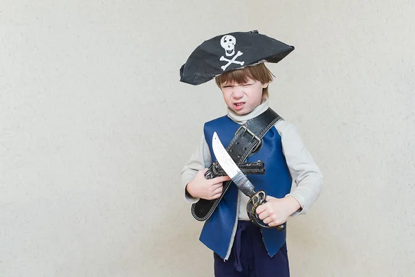 Child boy playing pirate
