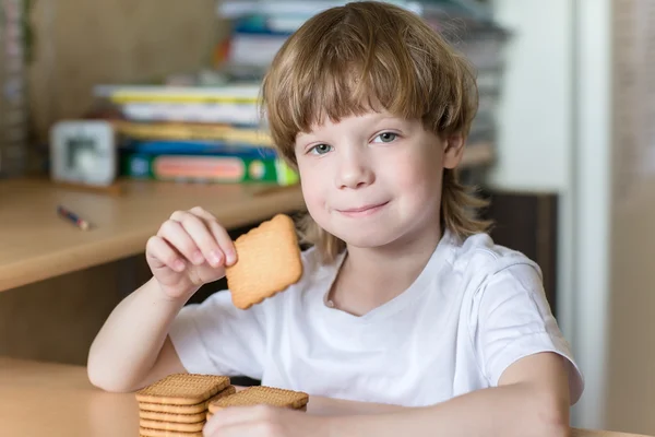 Child eating cookies