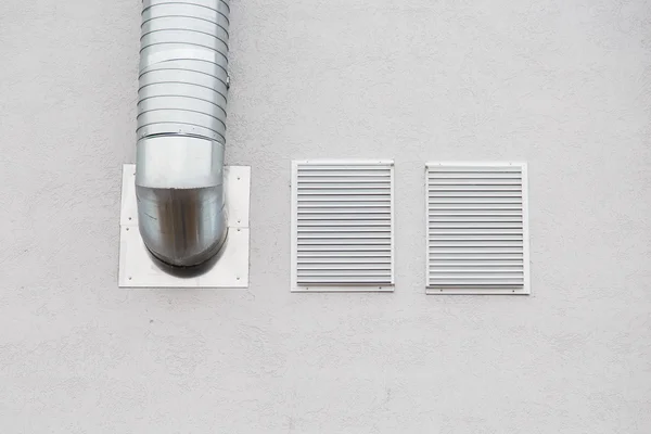 Industrial aluminum ventilation air duct on facade