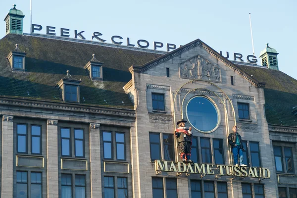 AMSTERDAM,THE NETHERLANDS - SEPTEMBER 9, 2014 : Statues on the facade of the museum Madame Tussauds in Amsterdam. Netherlands