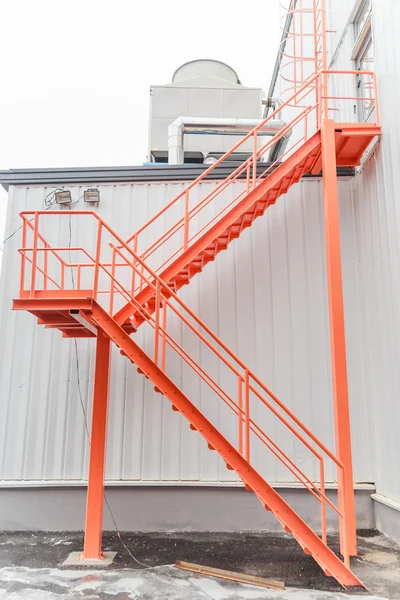 Fire escape ladder on modern industrial building