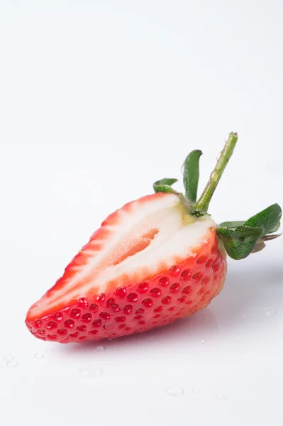 Half strawberry on white back ground