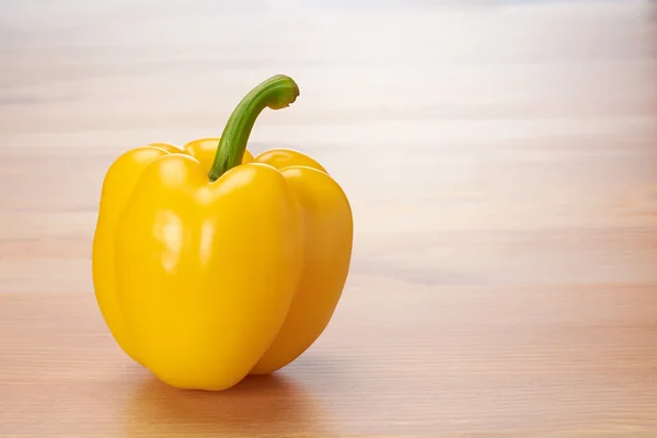 Yellow sweet pepper on the table