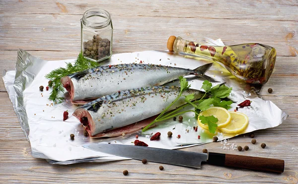 Fresh mackerel in foil with vegetable oil and spices