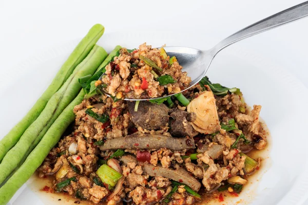 Thai ground pork salad, Spicy minced pork and pork liver salad on spoon.