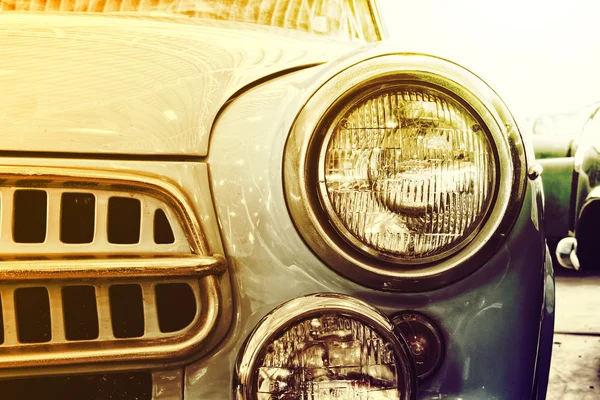 Close Up of Headlight Lamp BVintage Classic Car. (Vintage Effect Style)