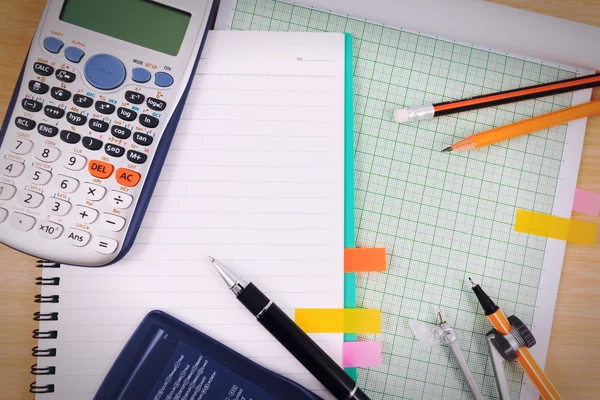 Office table desk with set of Office Stationery or Math Supplies.