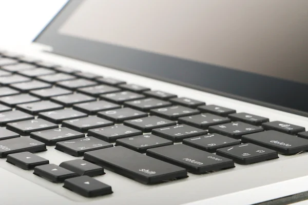 Laptop, Notebook computer on white background, close-up, isolated, white aluminium body.