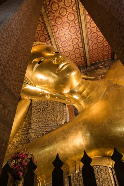 The Golden Giant Reclining Buddha (Sleep Buddha) in Wat Pho Buddhist Temple, Bangkok, Thailand