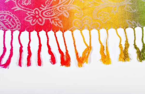 Indian scarf rainbow colors with brushes on a white background