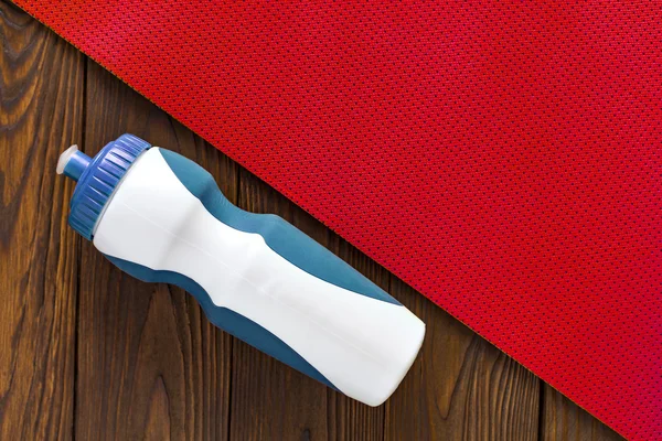 Fitness for a bottle of water. Texture yoga mats and boards