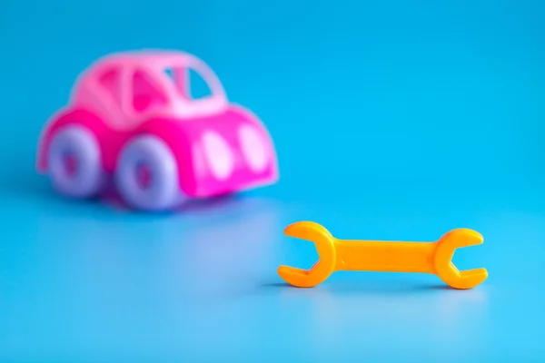 Plastic toys for children on a blue background