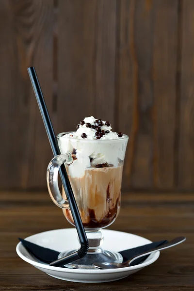 Coffee with cream and chocolate balls