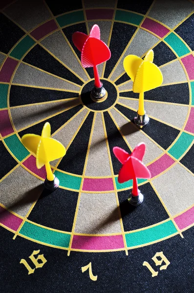 Darts hit the target in bull