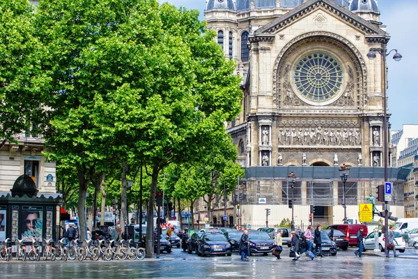 Lively square in front of Saint-Augustin church, Paris