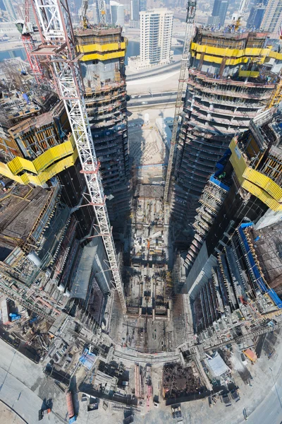 United Arab Emirates, Dubai, 05/21/2015, Damac Towers Dubai by Paramount, construction and building ariel views with cityscape background