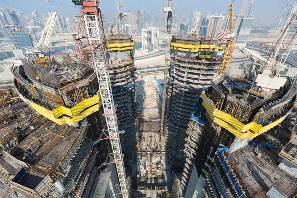 United Arab Emirates, Dubai, 05/21/2015, Damac Towers Dubai by Paramount, construction and building ariel views with cityscape background