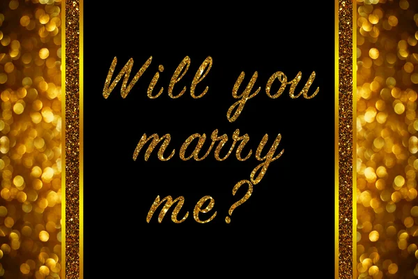 Will you marry me? word on rose gold bokeh abstract background