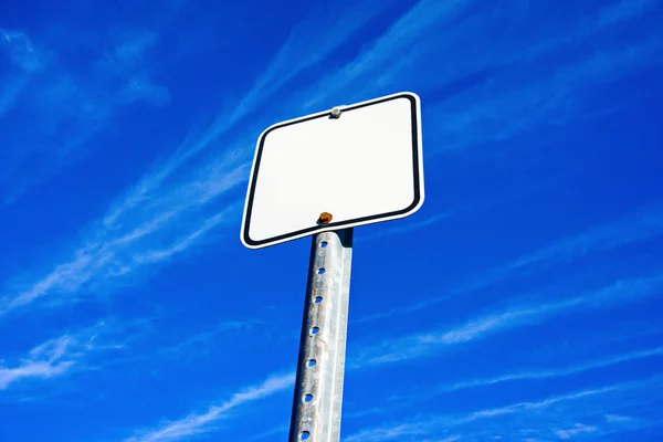 Empty sign on blue sky