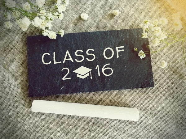 Blackboard for your text and flowers with words class of 2016