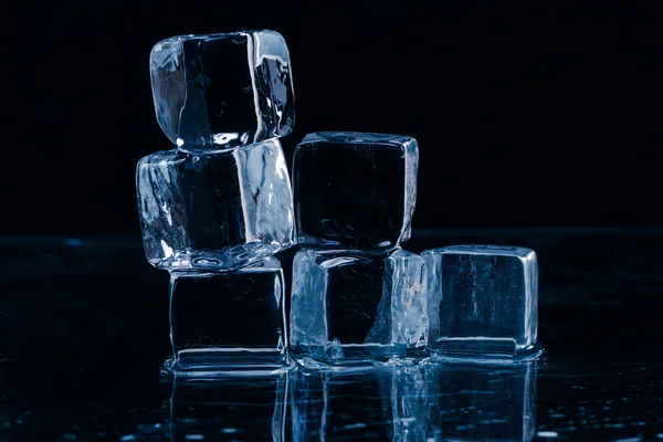 Ice cubes on table