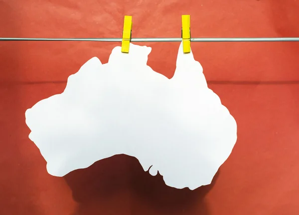 White Australian maps and flag hanging pegs ( clothespin ) on a