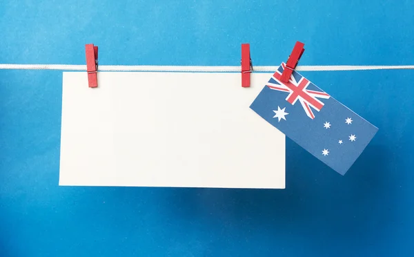 White paper sticker (space for text), Australian  flag hanging p
