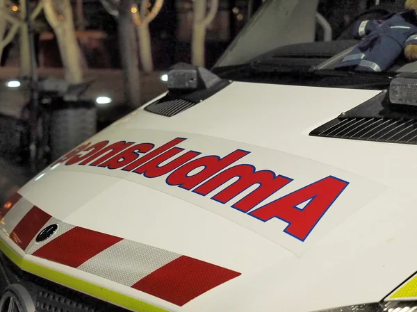Ambulance vehicle front at a late night emergency
