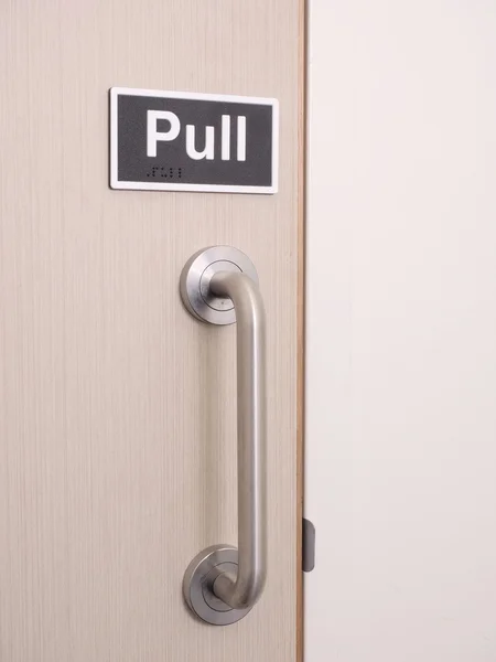 Pull handle on door