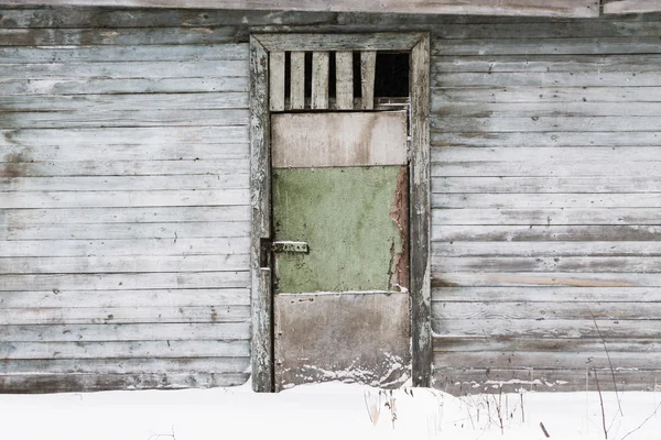 Abandoned barn with an interesting texture of the wall