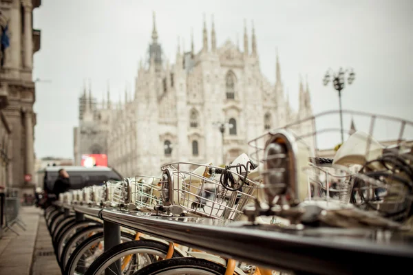 Different view to Duomo di Milano, Renting bicycle park in Milano, Italy