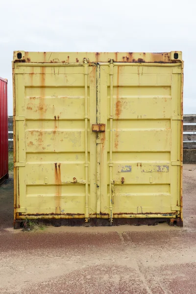 Yellow colored shipping container close up