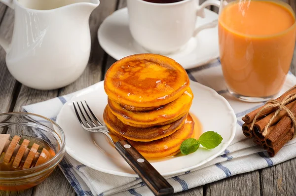 Pumpkin pancakes with honey