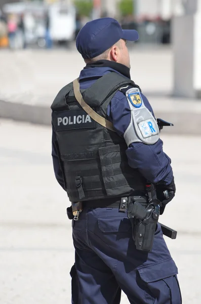 Policeman  on duty at Praca dos Comercio Lisbon Portugal.